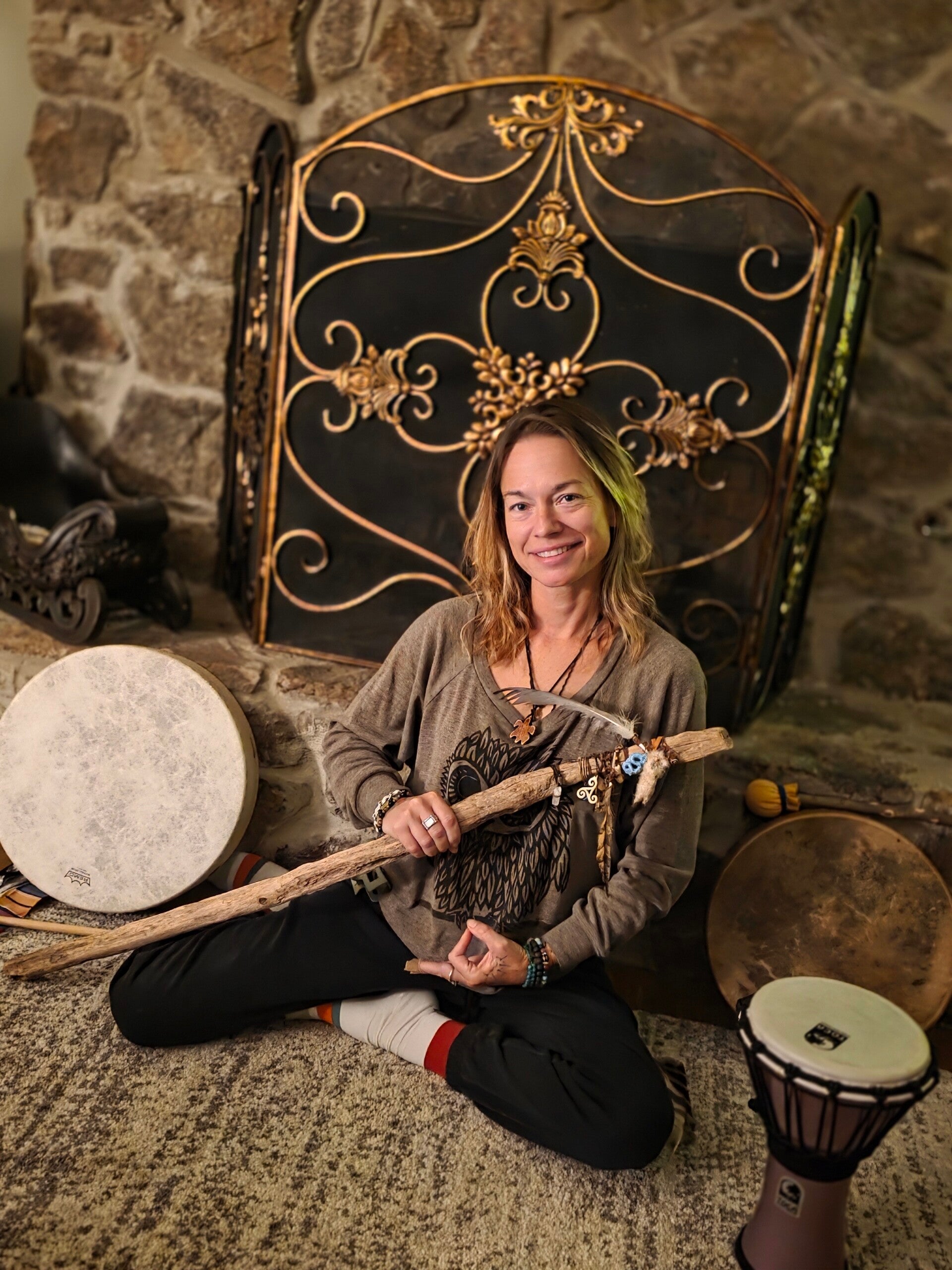 Shamanic sound healing session, representing balance and direction, ohm hand mudra showing connection between individual and universe 