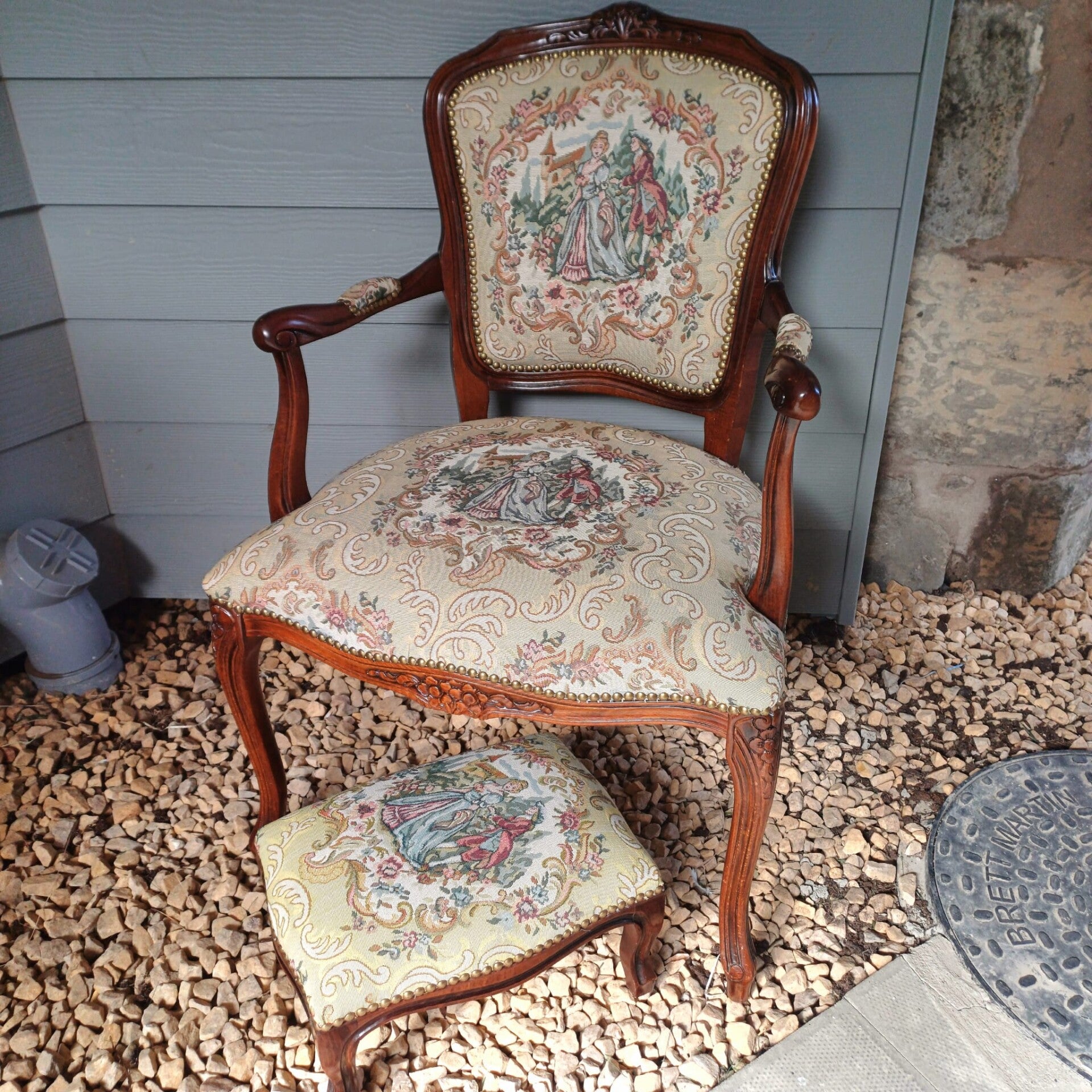 Vintage Louis XV style tapestry armchair with matching footstool
