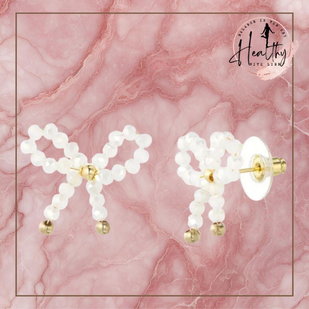 Witte strikjes oorbel