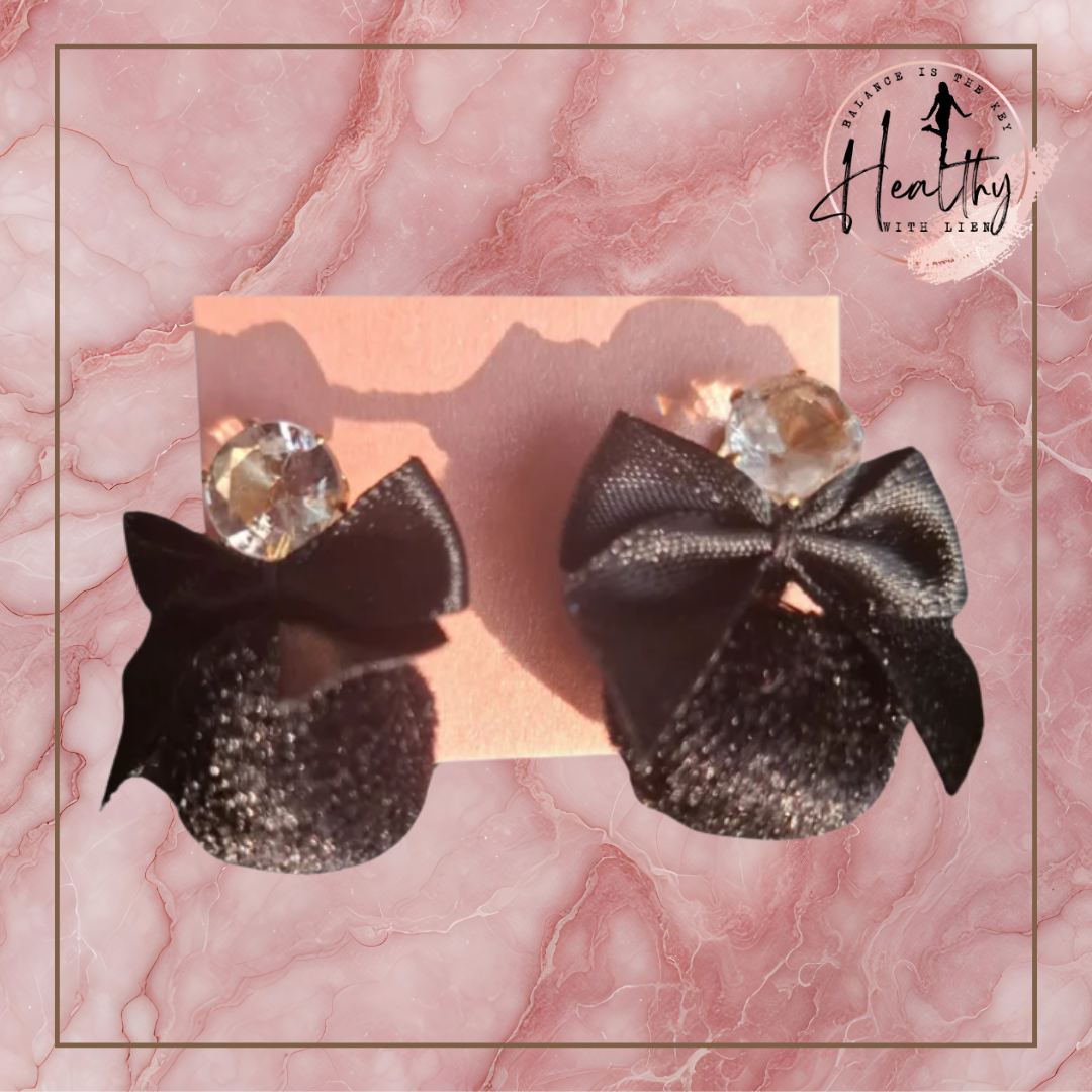 Zwarte glamour oorbellen met strik