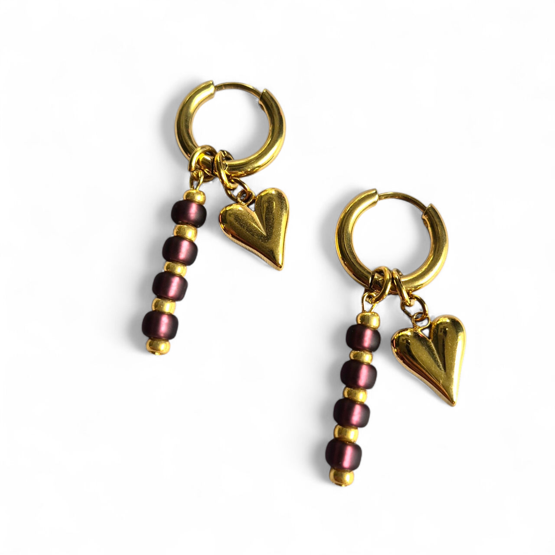 Creolen met aubergine kraaltjes en RVS hart