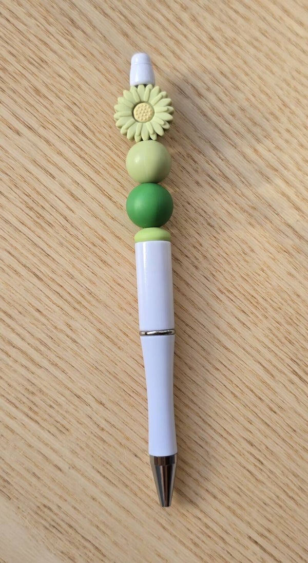 Stylo blanc ptite fleur verte