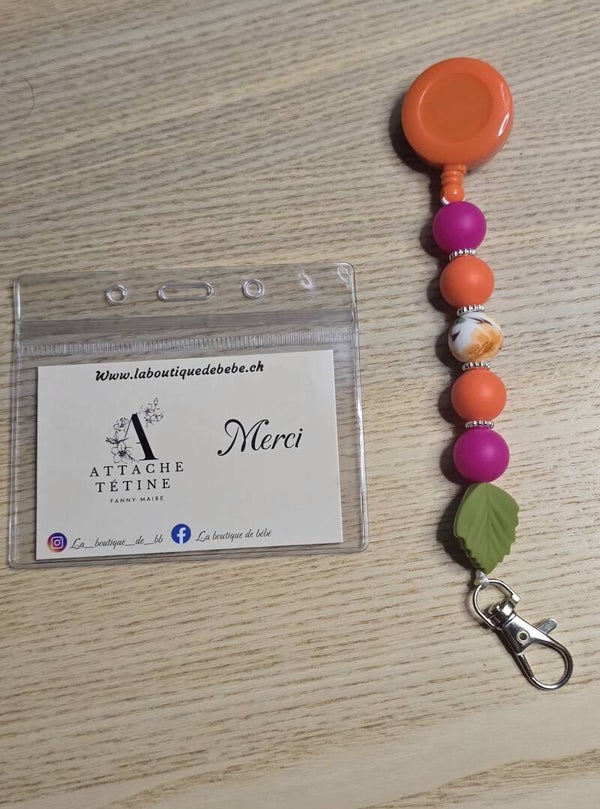 Porte-carte extensible orange/fuchsia et feuille