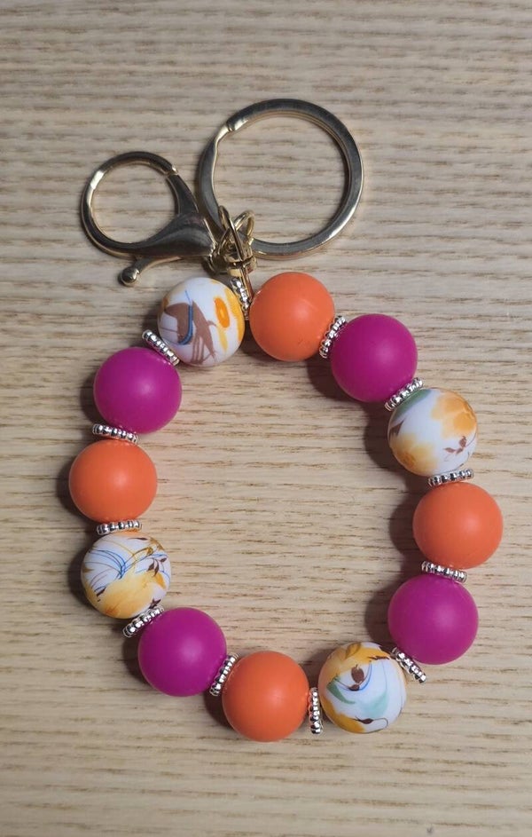 Porte-clés bracelet orange/fuchsia