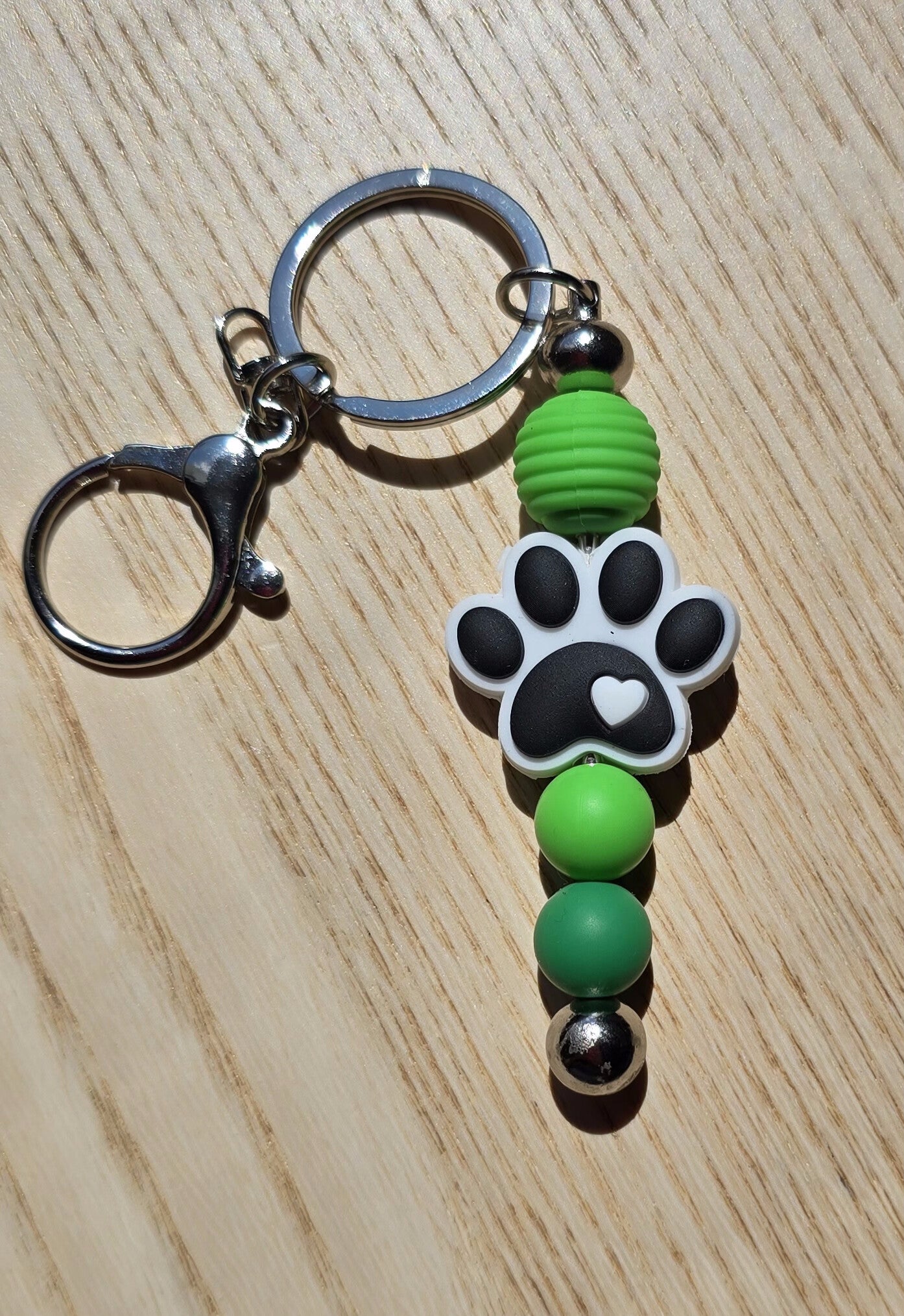 Porte-clef métal patte verte