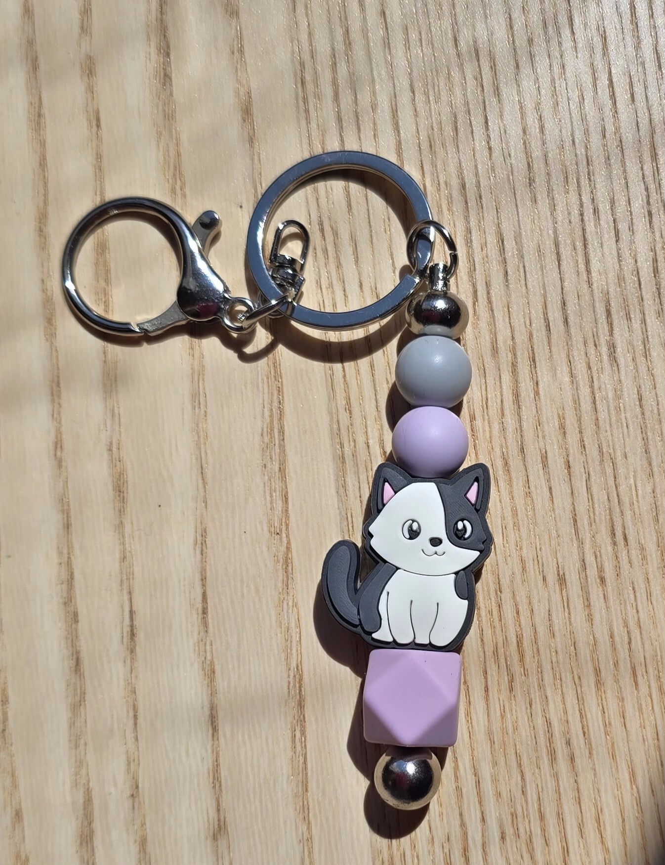 Porte-clef métal chat blanc et noir