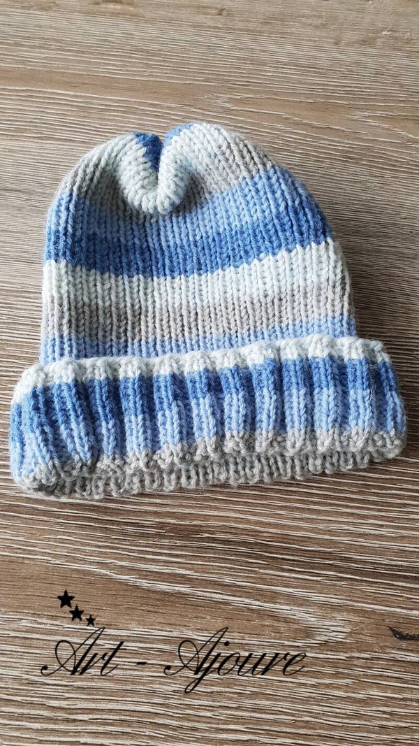 Art-Ajoure handgebreide kids muts.