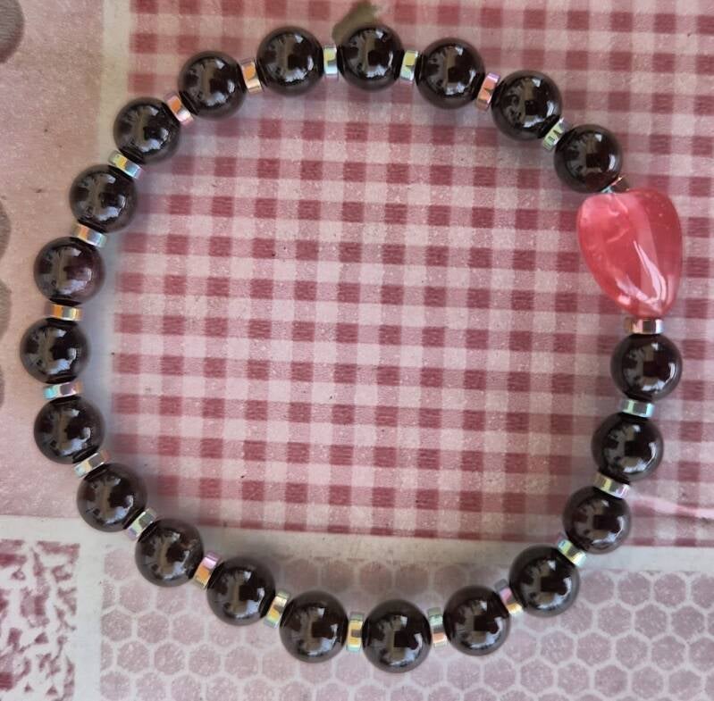 Granat mit Edelstahl zwischen Perlen und einem Erdbeerquarz Herz CHF  30.00