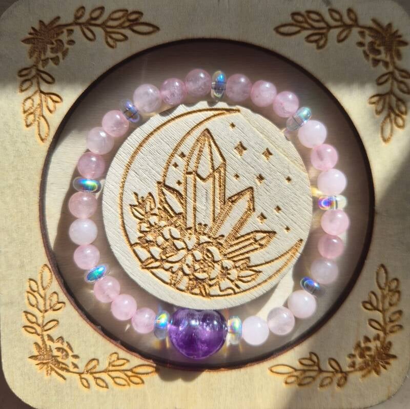 Rosenquarz mit Auraquarz und einem Amethyst Herz CHF 35.00