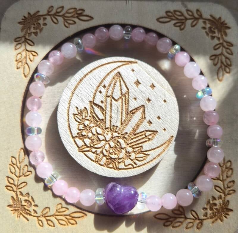 Rosenquarz mit Auraquarz und einem Amethyst Herz CHF 35.00