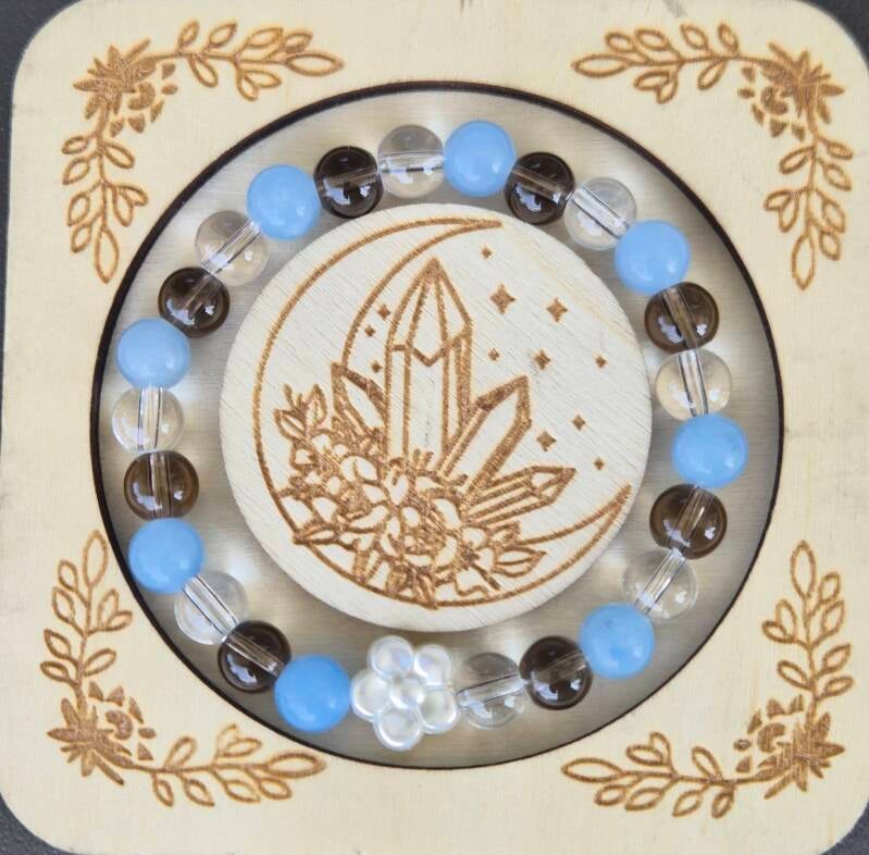 Aquamarin / Rauchquarz / Bergkristall mit Blume CHF 35.00
