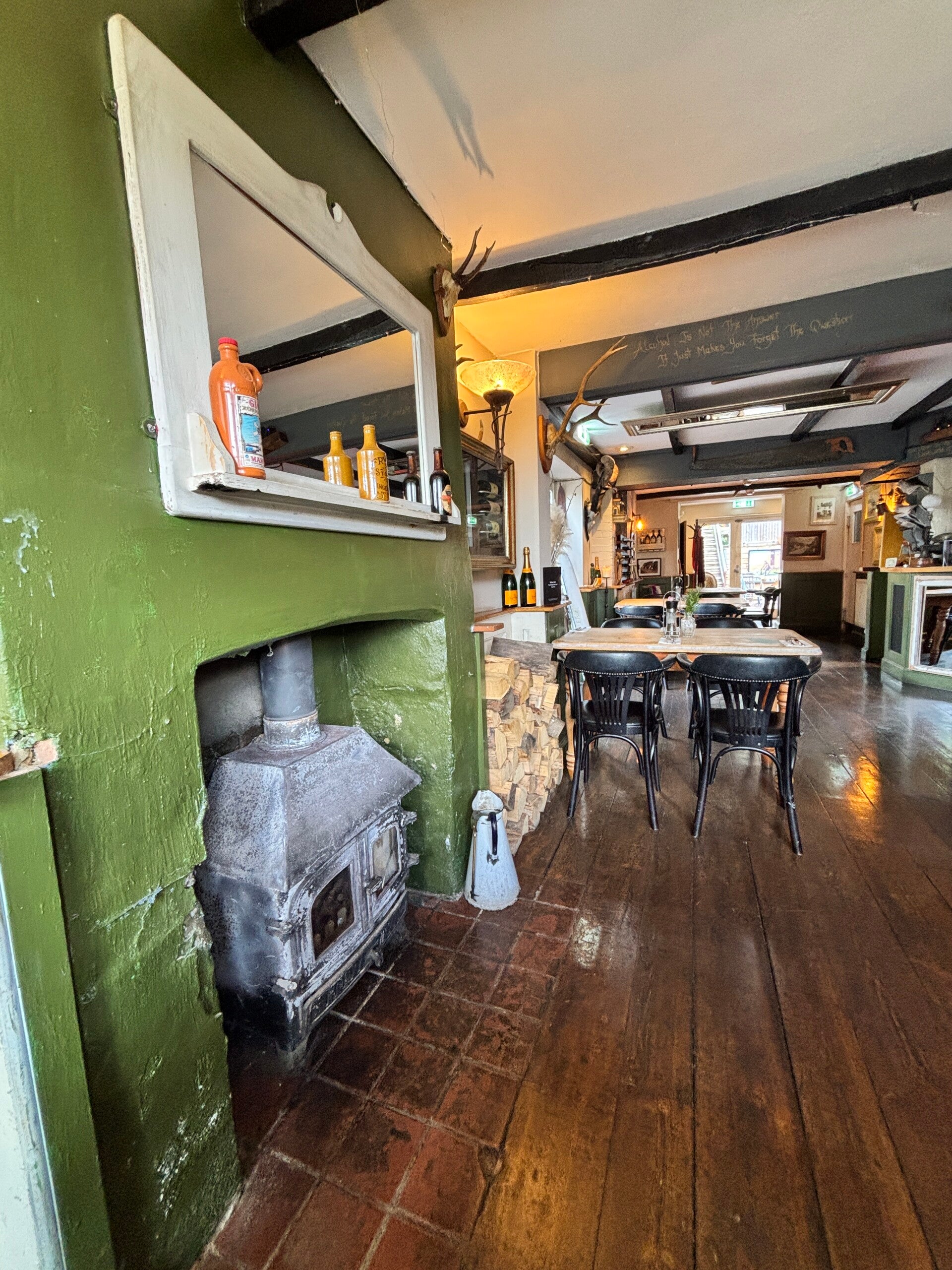 Log burner at The Shepherd's Hut, Ewelme