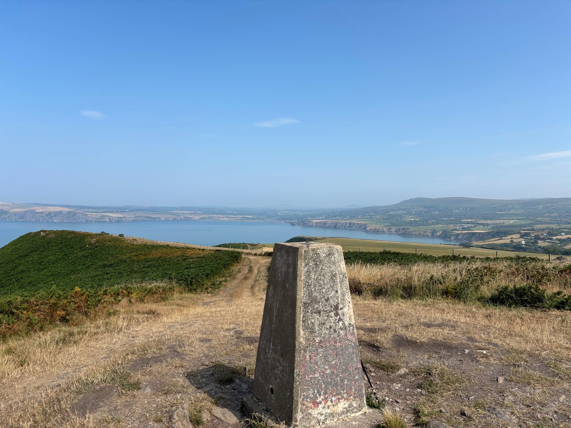 Trig point on Dinas Head