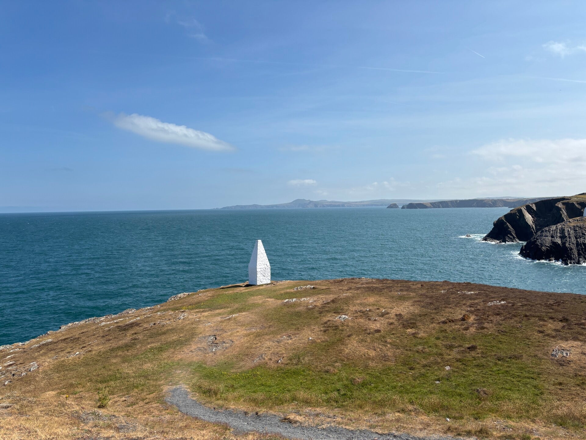 White markers to guide ship into Porthgain Harbour
