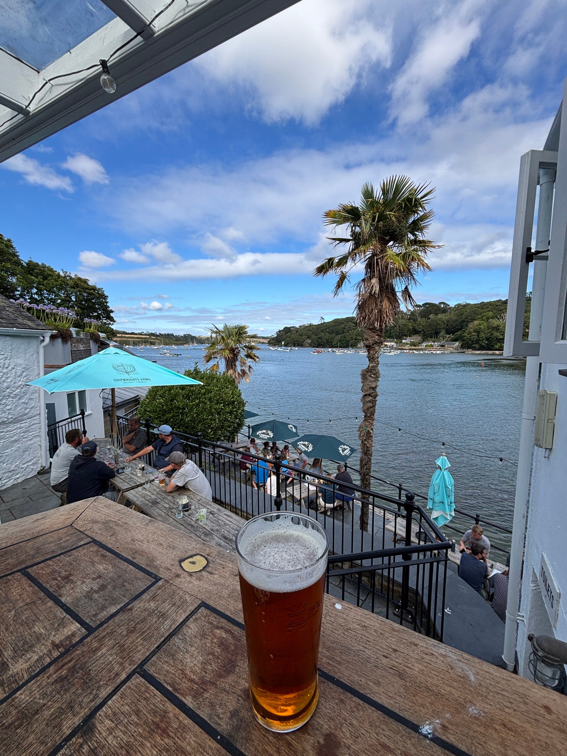 View of River Helford from upper terrace at The Shipwrights Arms-Helford