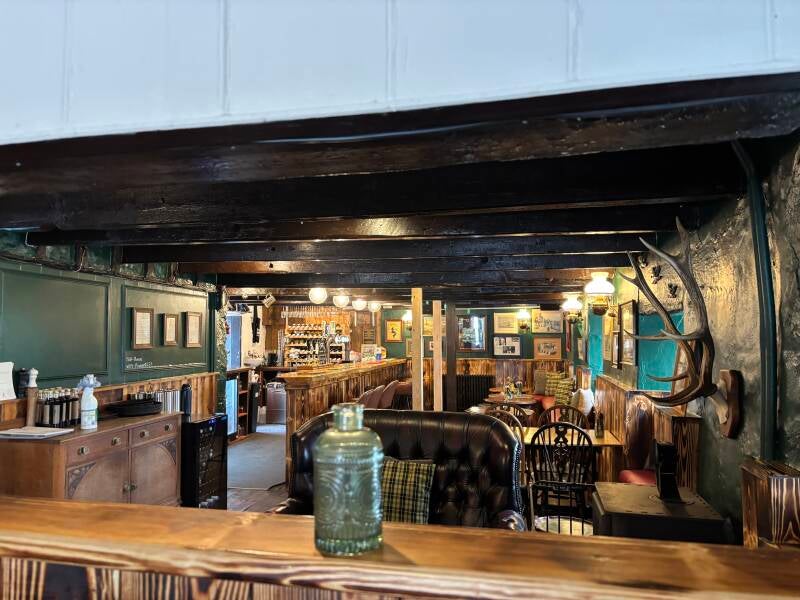 Cosy seating areas and public bar at The White Hart in Ludgvan