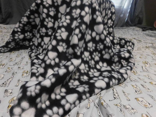 Black with White Paw Prints