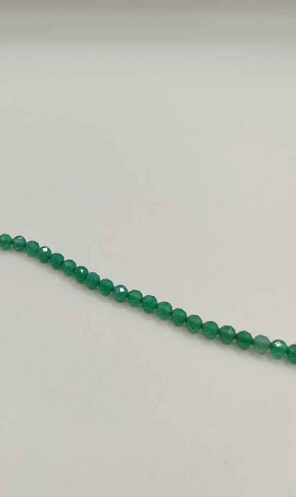 3 mm faceted Onyx green       per 10 stuks