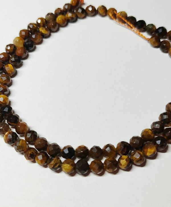 4mm faceted Tiger Eye              per 10 stuks