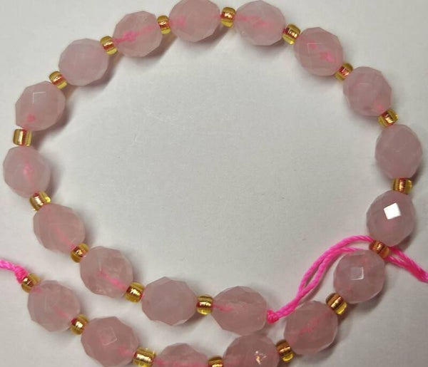 Ovaal 9x8 faceted Rozenkwarts     per stuk