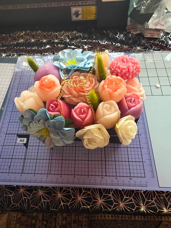 „Geurend wasbloemen arrangement