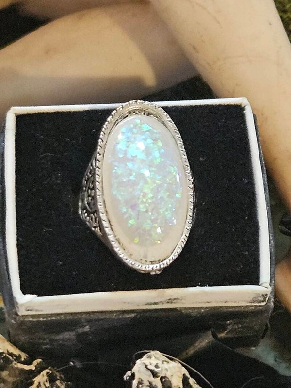 ALL NATURAL ETHIOPIAN OPAL SET IN STERLING SILVER ELINGATED US SIZE 5