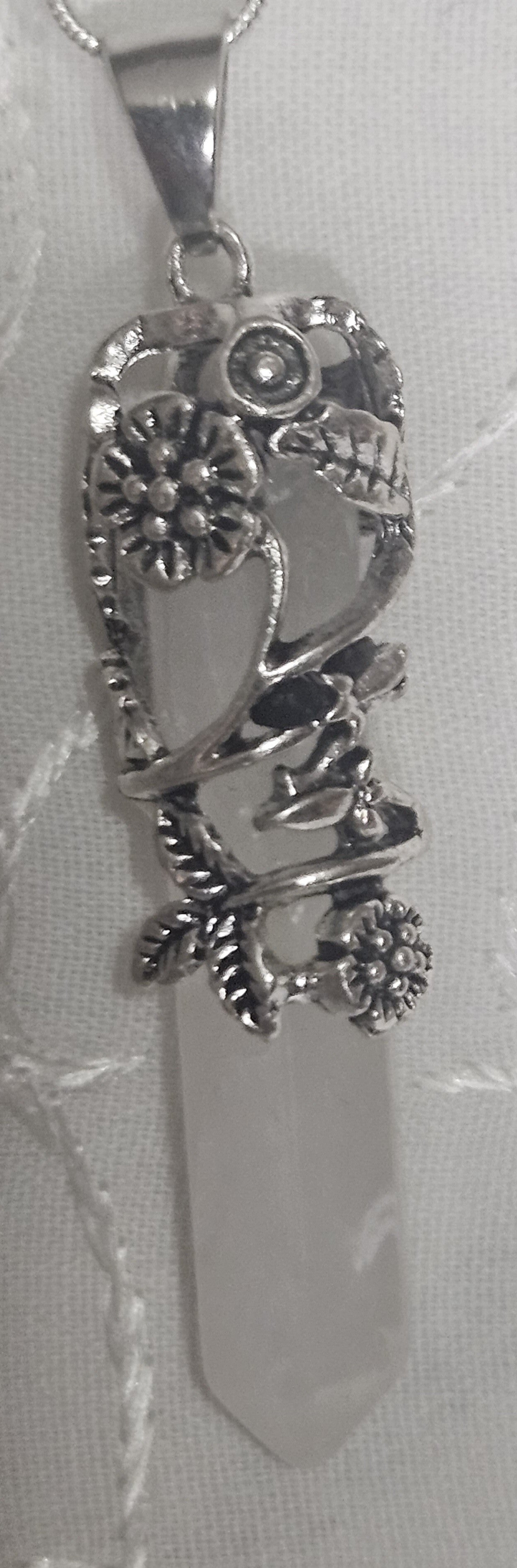 LARGE NATURAL QUARTZ CRYSTAL POINT WRAPPED IN STERLING SILVER ROSES