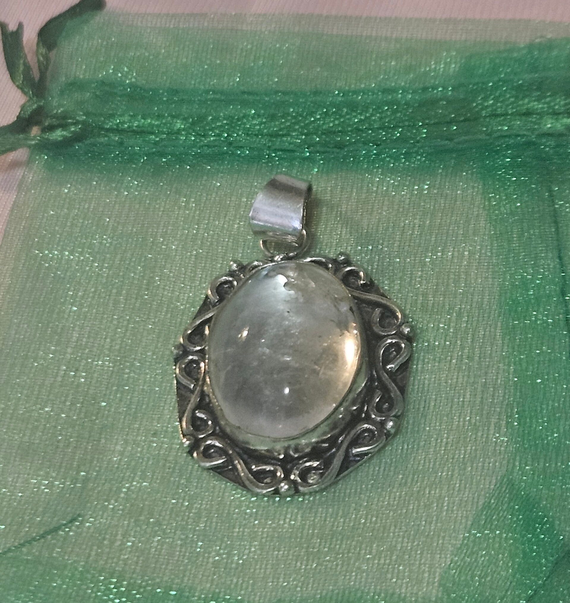 NATURAL CLEAR QUARTZ CRYSTAL SET IN SOLID STERLING SILVER