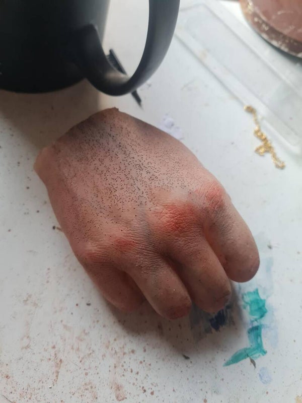 DISEMBODIED HAND