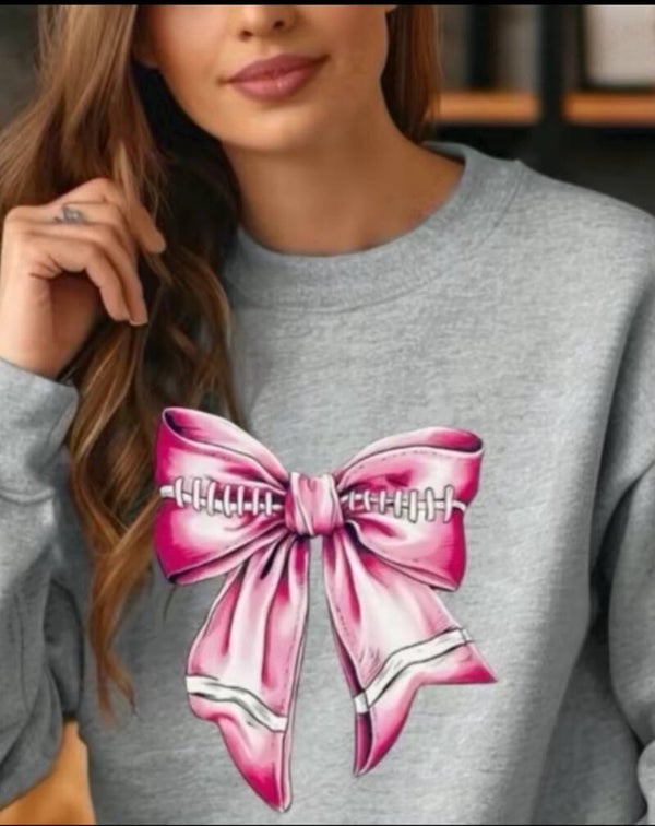 Pink Bow On A Sweatshirt