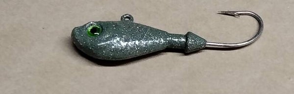 boat jig 55 gms speckled dark green eye colour will vary
