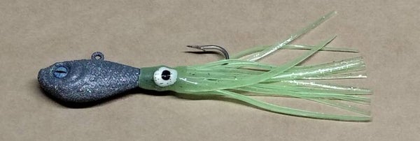 boat jig speckled dark grey 55gms with squid skirt eye colour will vary