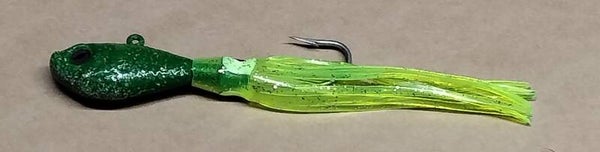 boat jig speckled green 55gms with squid skirt eye colour will vary