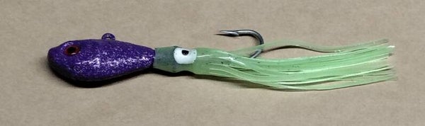 boat jig speckled purple 55gms with squid skirt eye colour will vary