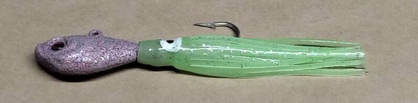 boat jig speckled red grey 55gms with squid skirt eye colour will vary
