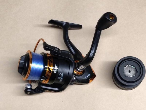 Medium reel  kawhai new 18 lbs line with spare spool