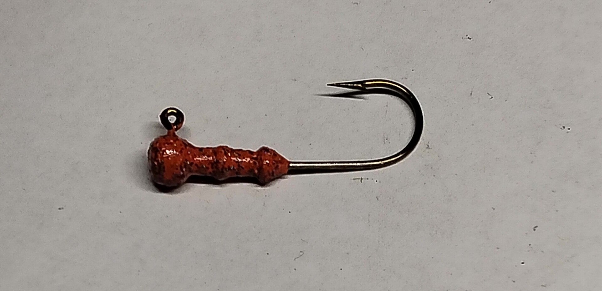 round head trout jig 2.2 gms speckled orange