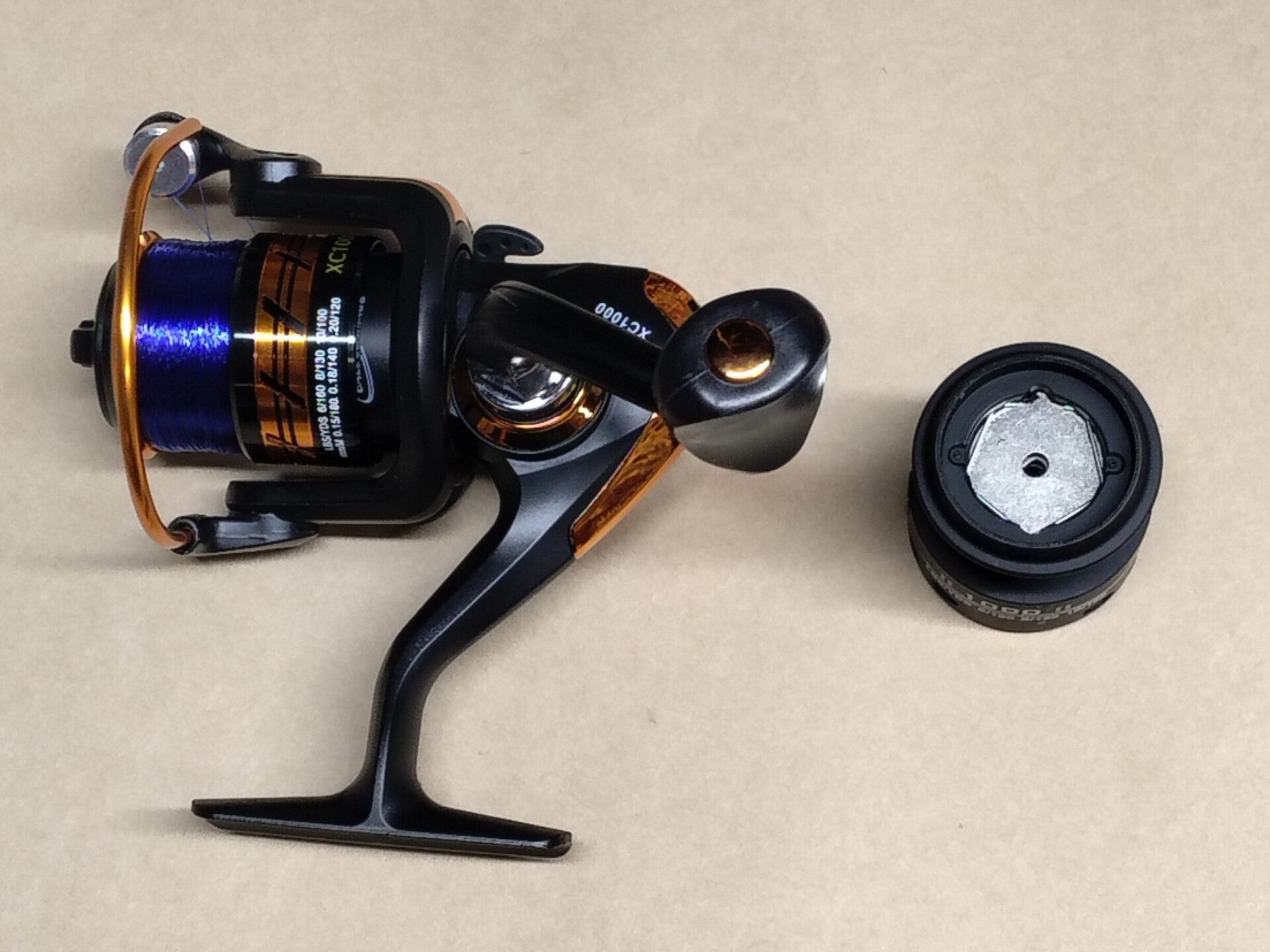 Trout reel ( new)xc1000 With line 5.5 lbs  and spare spool
