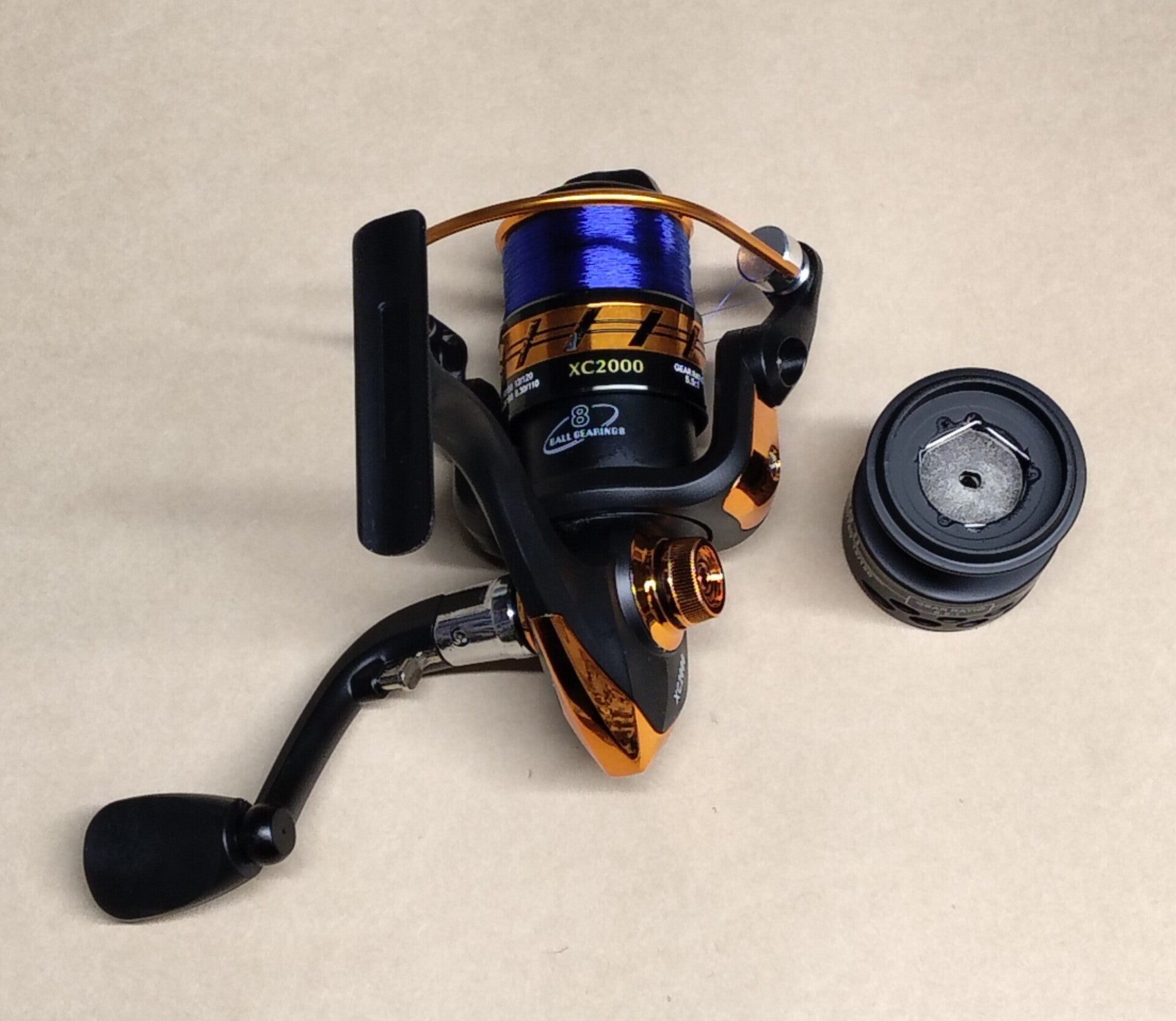 Trout reel ( new) xc2000 Lined with 5.5 lbs line with spare spool