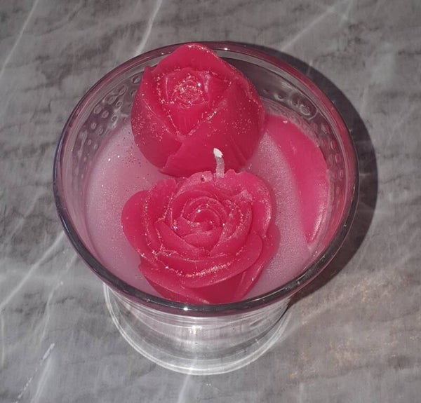 Blumenkerze im Glas