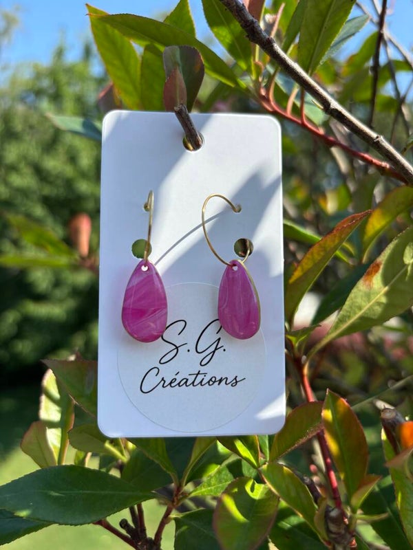 Boucle d'oreilles roses et dorées