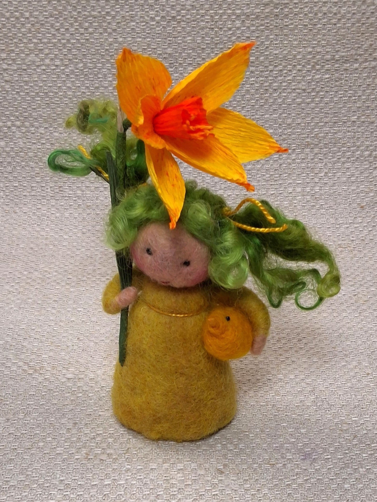 132. Naaldviltpopje Narcis met kuikentje