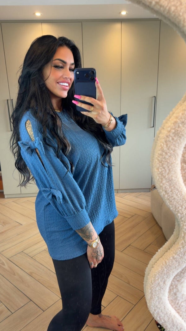 Crêpe shirt in blauw met strikken