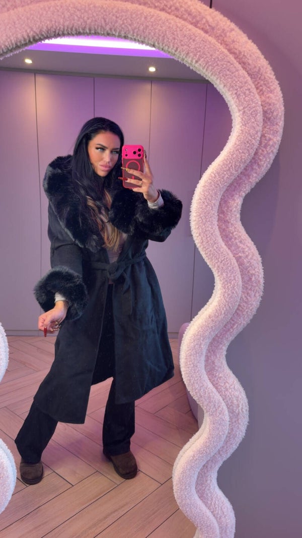 Zwarte fake fur manteljas
