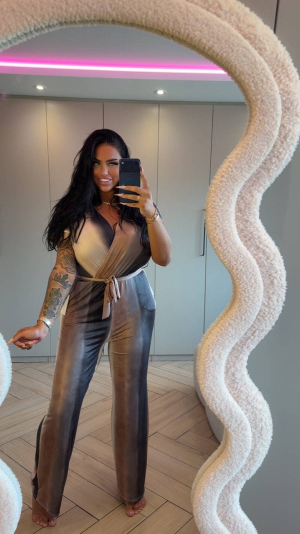 Travelstof jumpsuit zwart goud