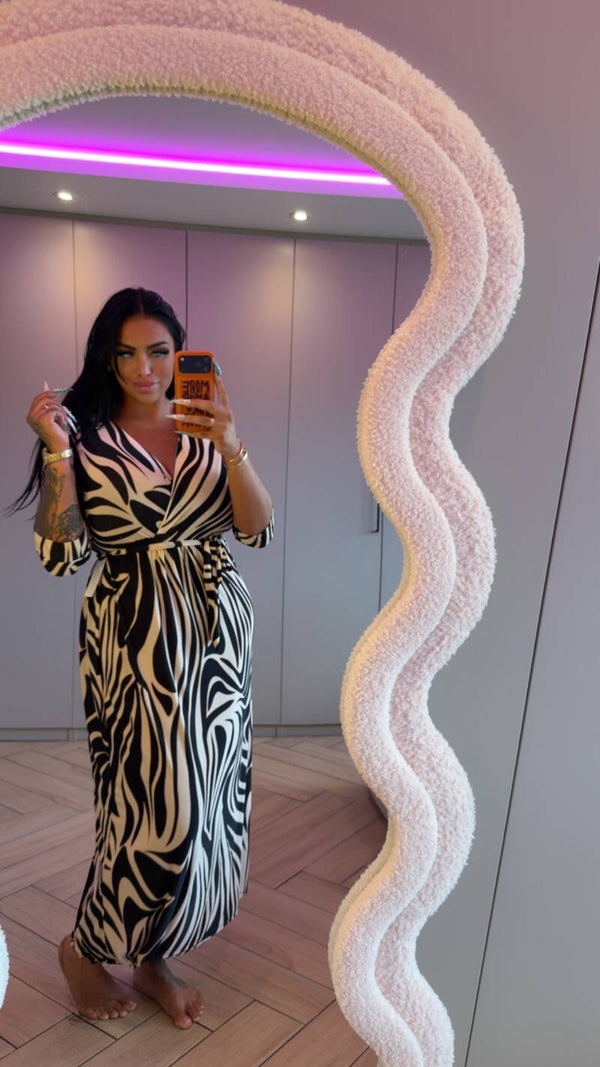 Travelstof jurk met mouw zwart goud