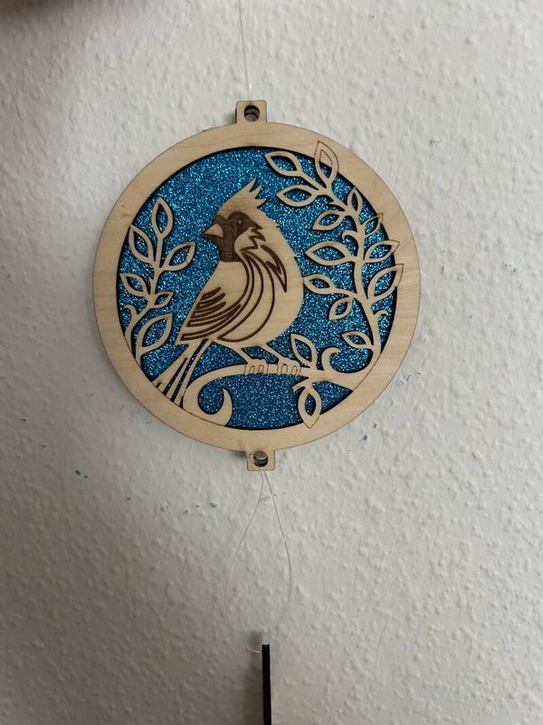 Sonnenspiel Vogel auf Ast