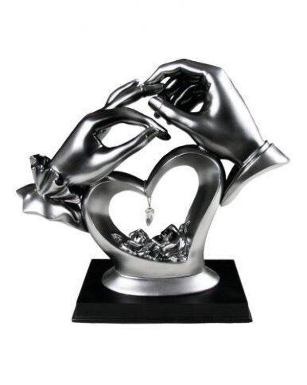 Handen met hart en kristal - small