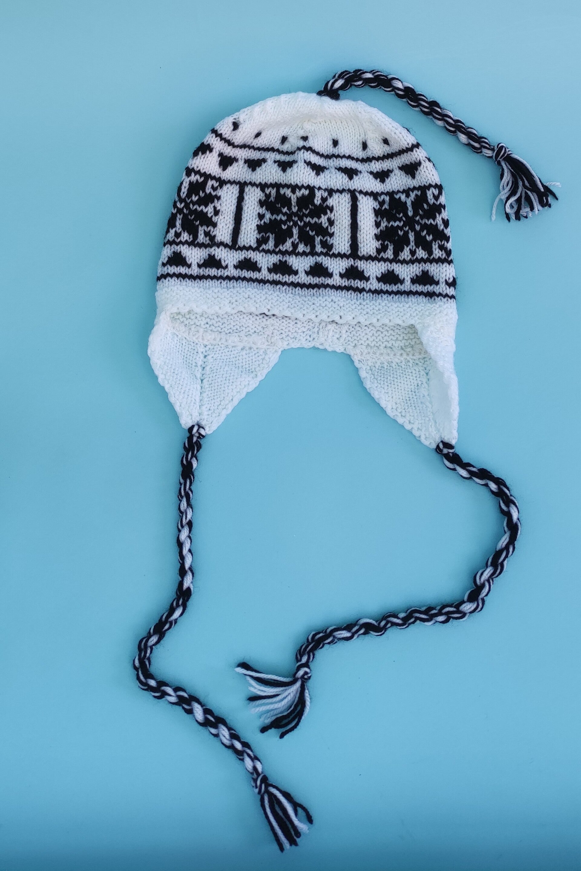 Ohrenstrickmütze schwarz/weiß Gr. S NEU