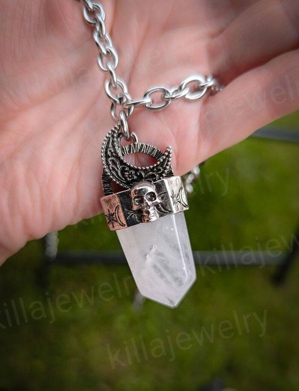 Natural crystal quartz pendant necklace with skull detail